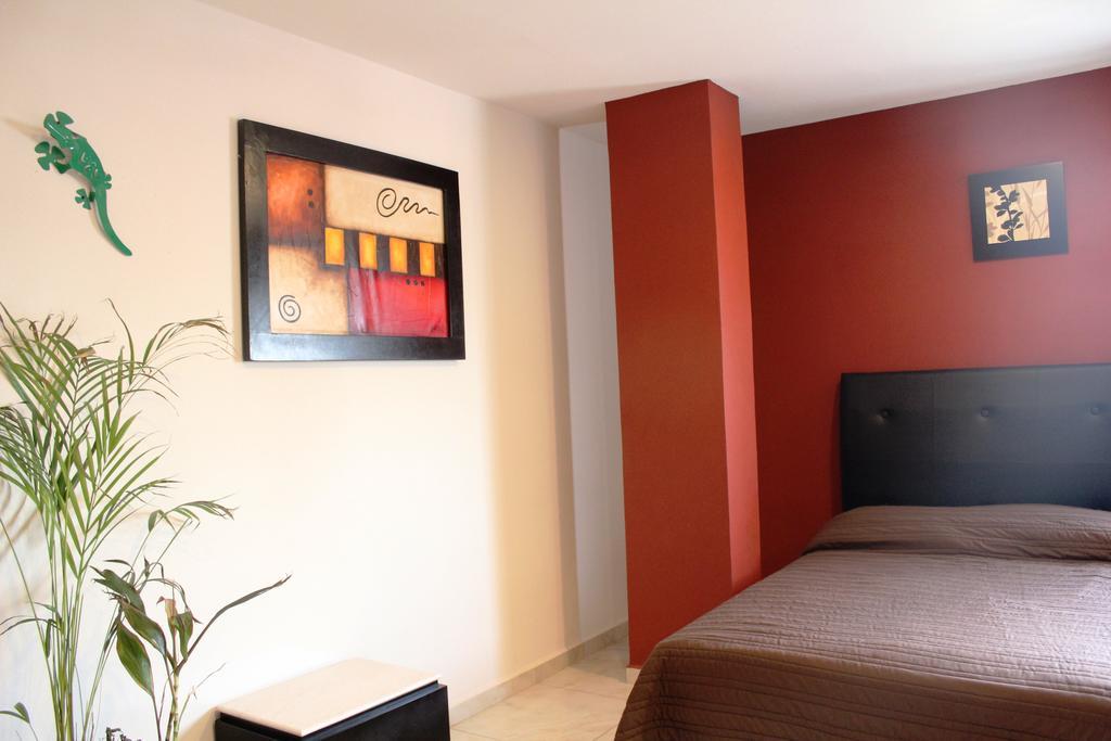 Hotel Leones ปวยบลา ภายนอก รูปภาพ